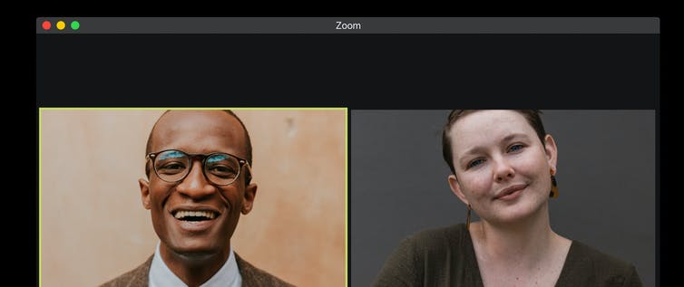 A man and woman on a Zoom call.