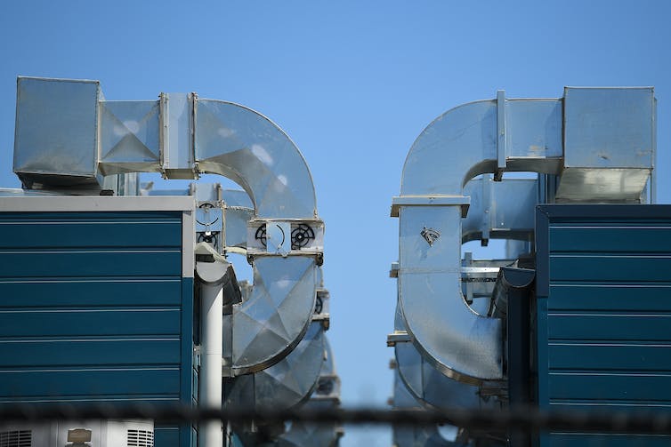 large ventilation and A/C unit on buillding