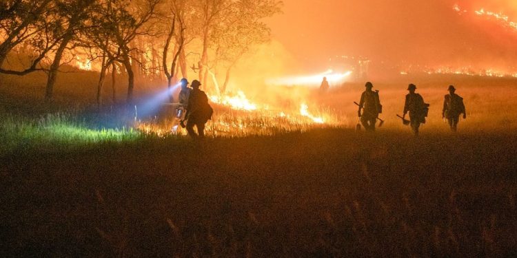 Wildland firefighters face an enormous pay minimize with out motion by Congress – here is how bodily demanding this lifesaving job is